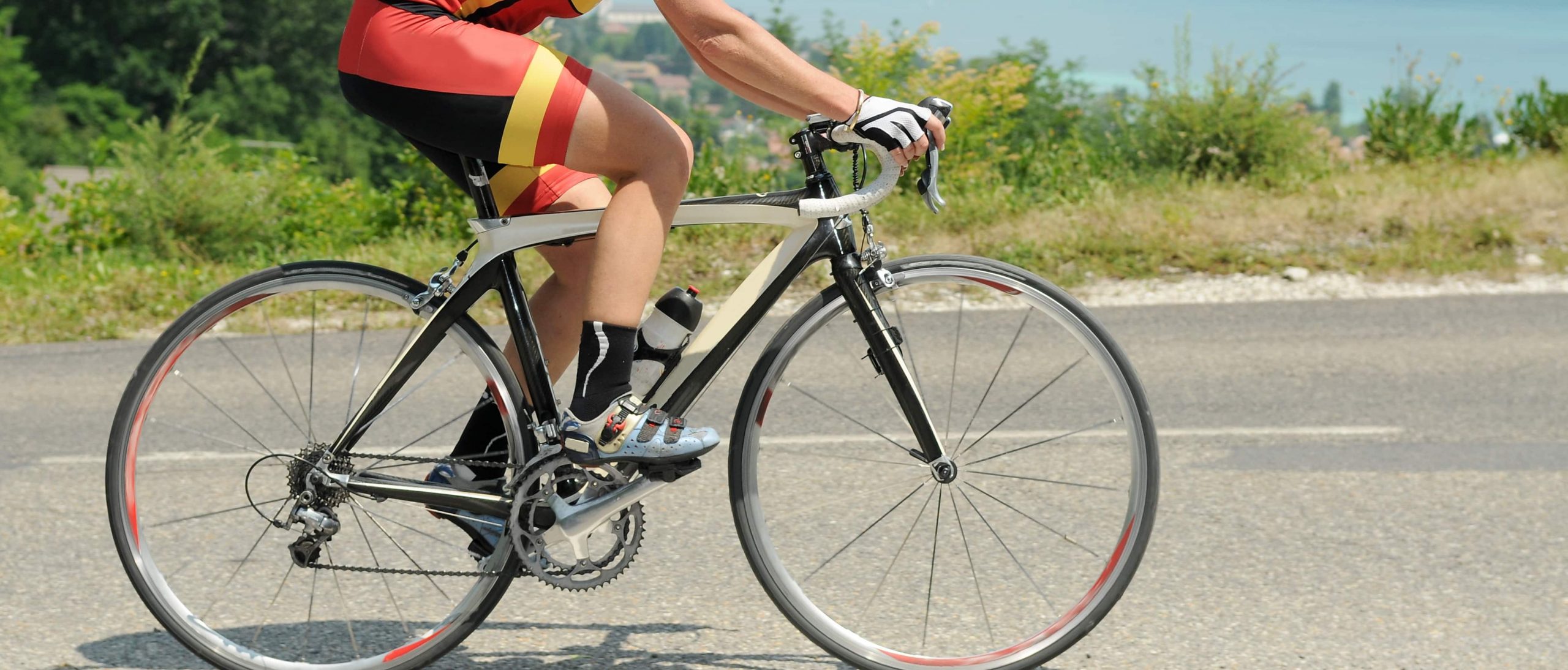 A person riding a bike on the road