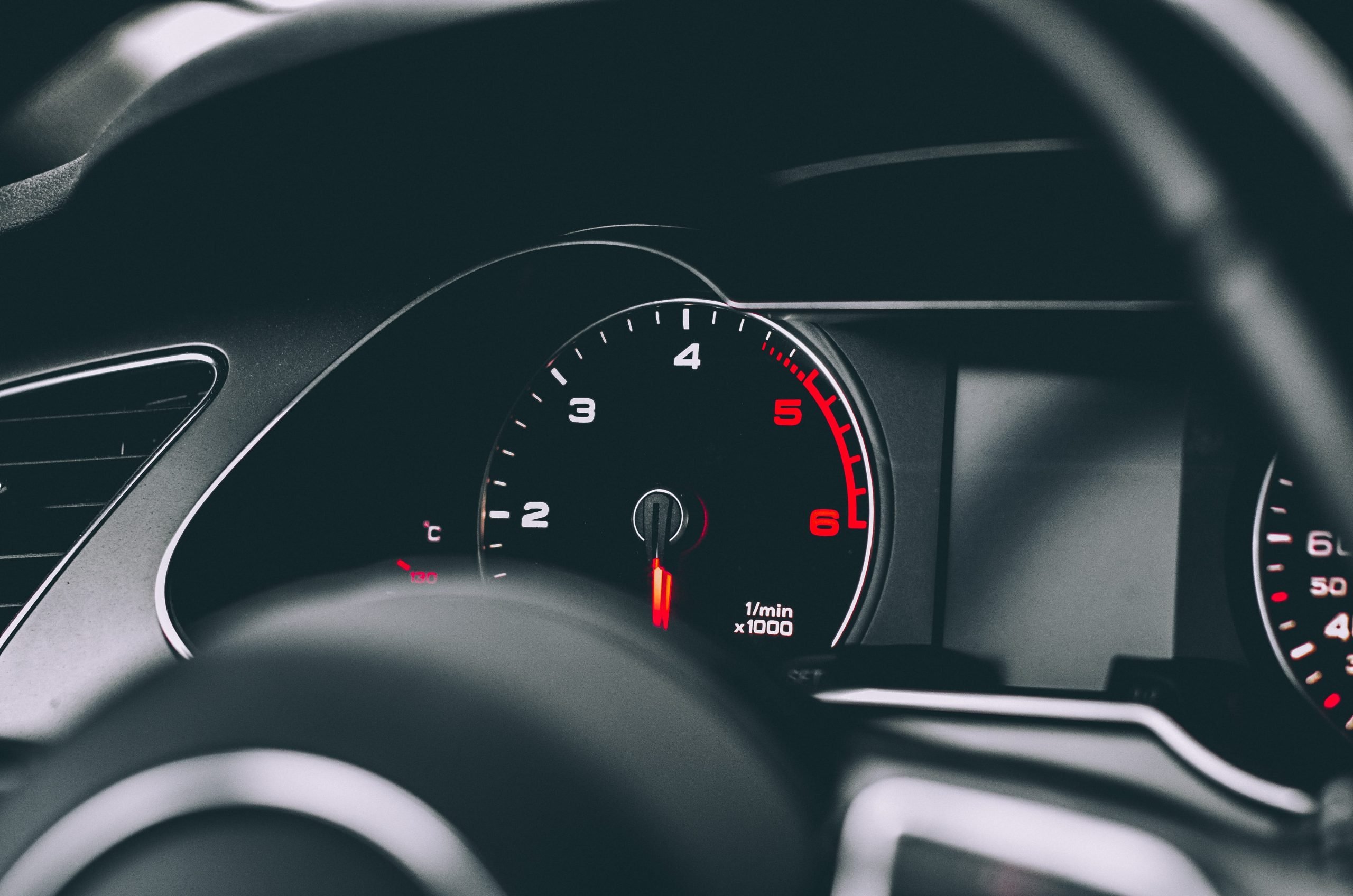 A close up of the speedometer in a car