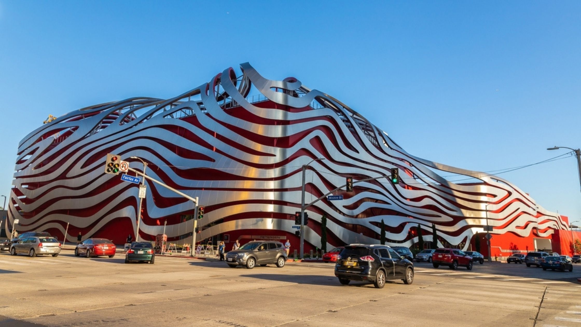 A large building with red and white stripes on it