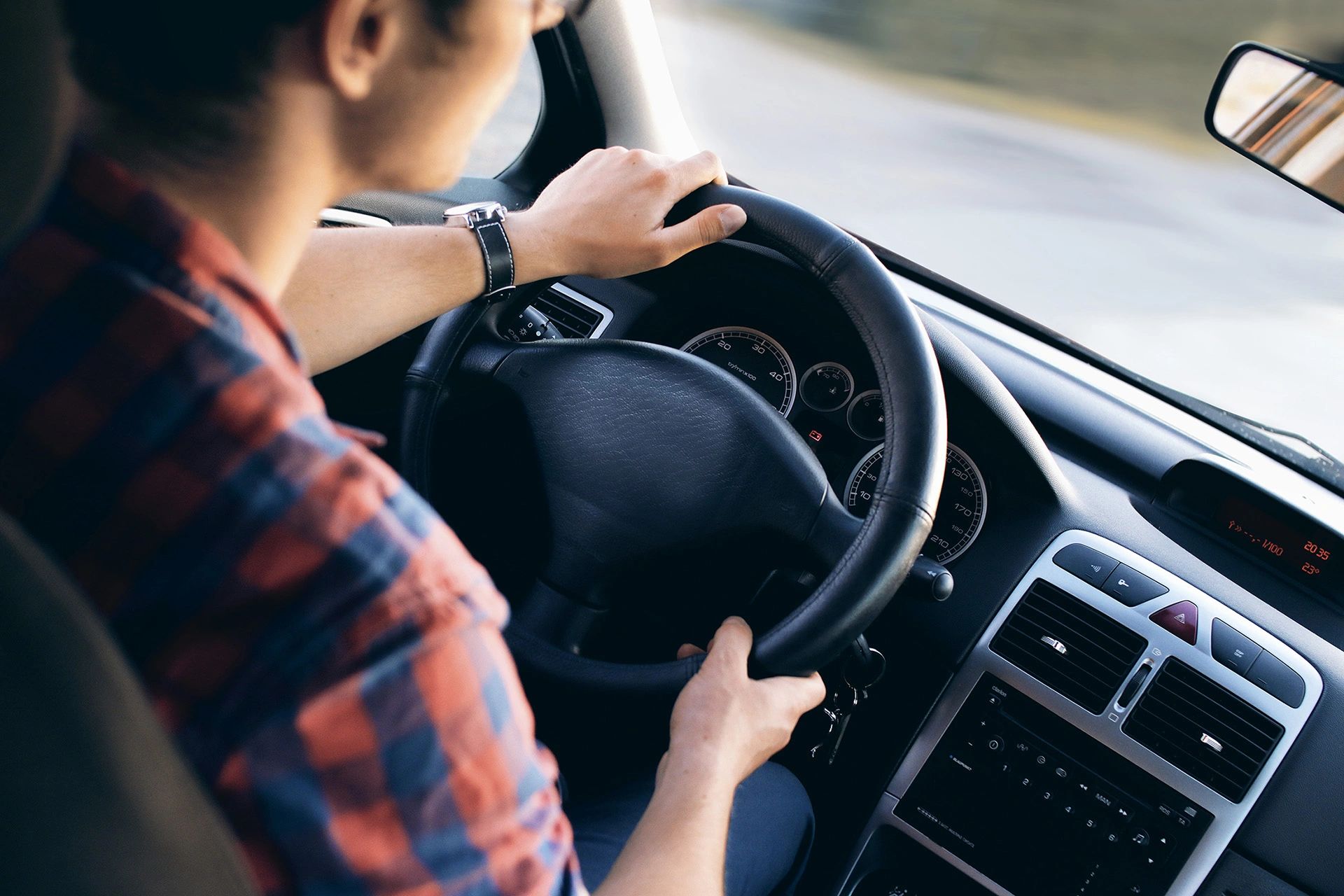 Teenage driver behind the wheel of car. Parents to help your teen become a safer driver